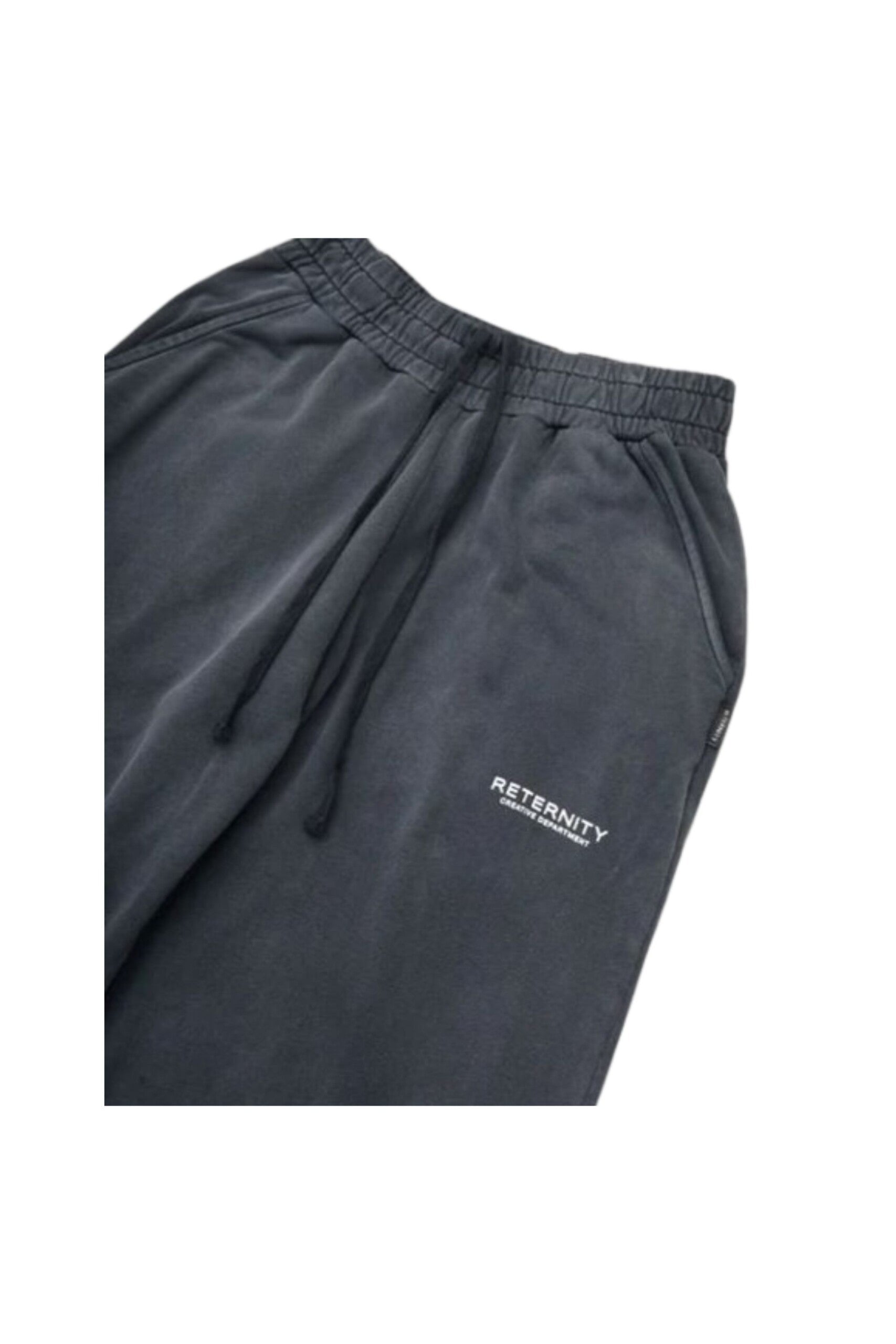 RETERNITY Pantaloni della tuta Creative Dept zoom logo
